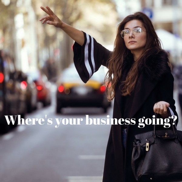 professional business woman with glasses and large bag